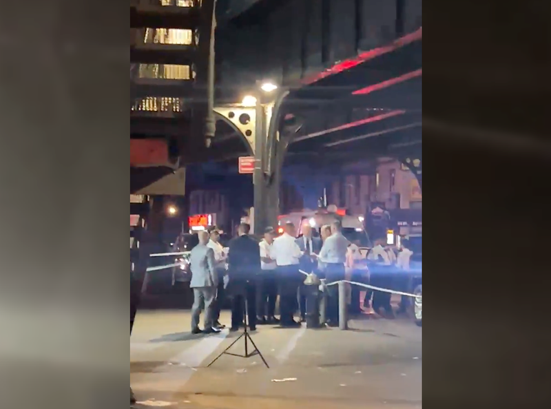 Police at the scene of the shooting Thursday