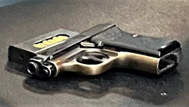 A New York man was arrested on Wednesday after agents at a John F. Kennedy Airport discovered an unloaded gun and loaded magazine in his carry-on.