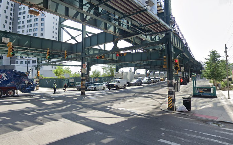 The intersection of Queens Boulevard and Jackson Avenue, where a man riding an electric scooter was killed by a school bus on Thursday.