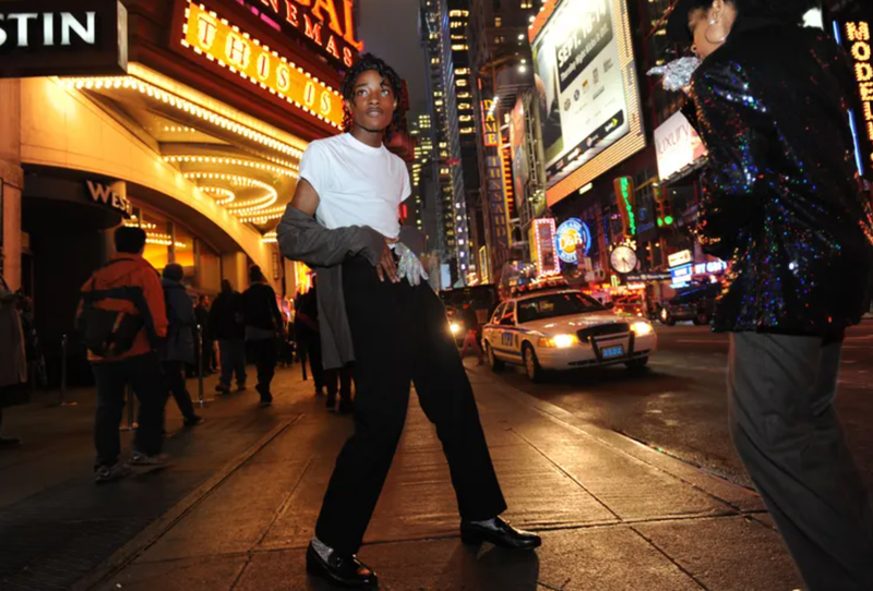 Jordan Neely, a longtime Michael Jackson impersonator, on his way to see the Michael Jackson movie "This is It" outside the Regal Cinemas in Times Square in 2009. A 24-year-old man choked Neely to death on the F train on Monday.