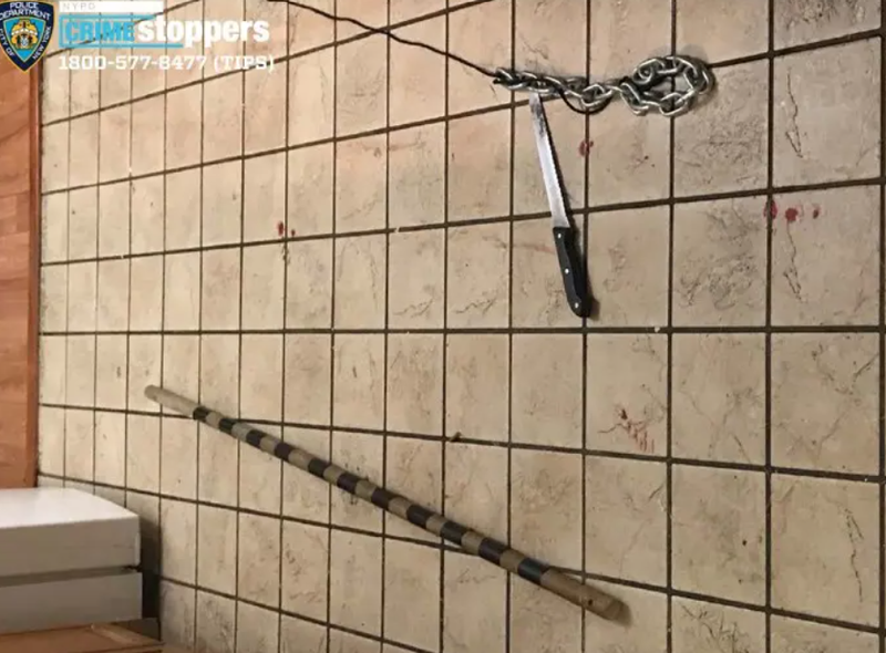 The stick and bread knife laying alongside drops of Trawick's blood.