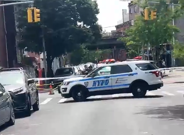 Police cordoned off the area where an SUV killed a pedestrian.