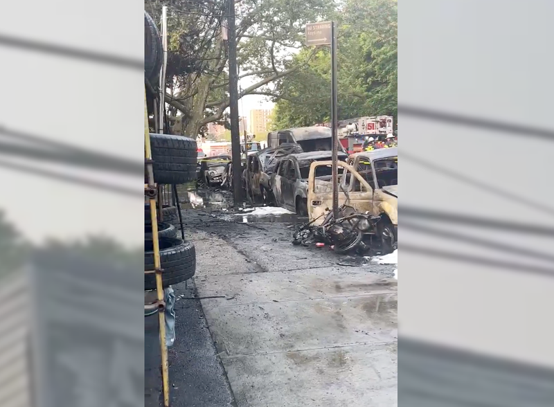 A half-dozen cars and a van were among the vehicles destroyed in the fire