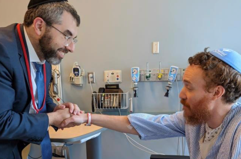 Rabbi Moshe Gewirtz, of Renewal, with Rabbi Aizik Baumgarten