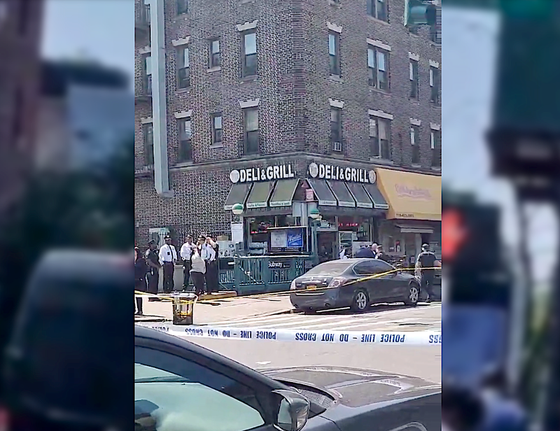 The NYPD investigated at the scene of a double shooting Wednesday in Crown Heights