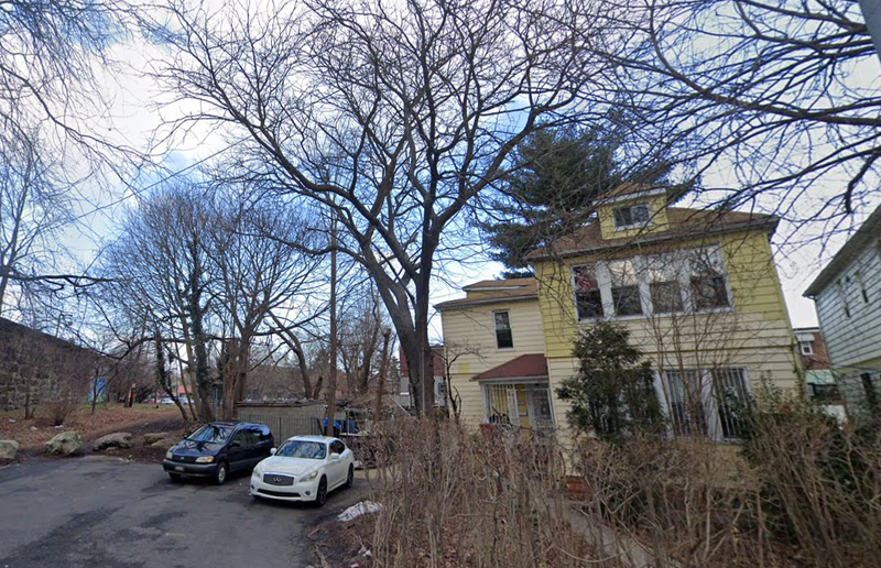 The Wakefield house where police found a body in a trash bin.