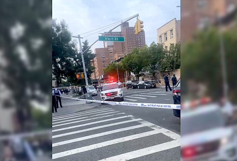 Police tape blocks off the intersection of Hart Street and Marcus Garvey Boulevard in Bedford-Stuyvesant, where a 16-year-old boy was fatally shot on June 19