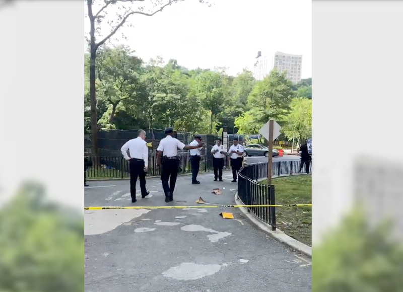 Police at the scene of Wednesday's fatal shooting