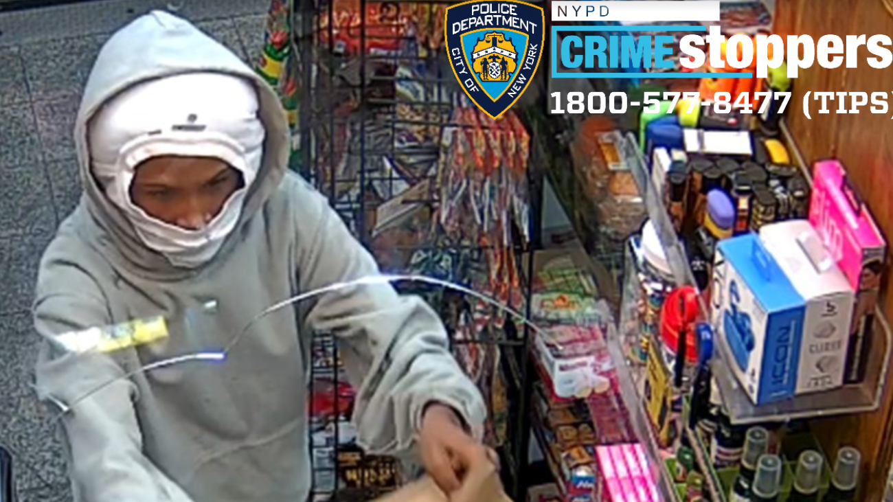 Cops searching for robber who held up Bronx deli at gunpoint