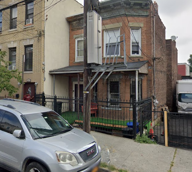 The Queens home where a 58-year-old woman was found dead a day after her son's corpse was discovered nearby.