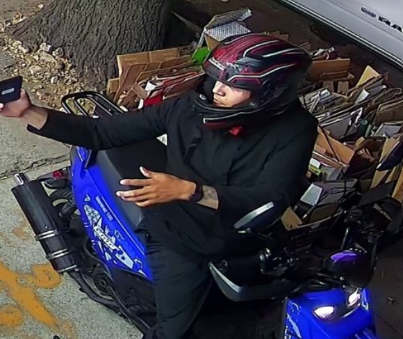 Police circulated a security camera image of the suspect while they were searching for him.