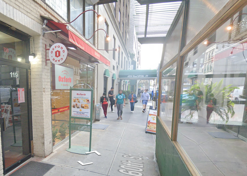 A man was driven through the front window of a cafe during a chaotic road-rage altercation on Wednesday evening