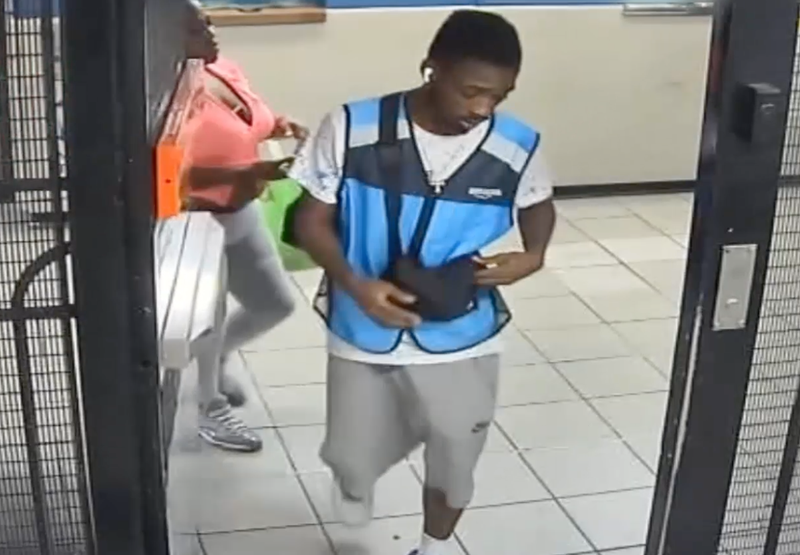 The male suspect appeared to be wearing a delivery vest