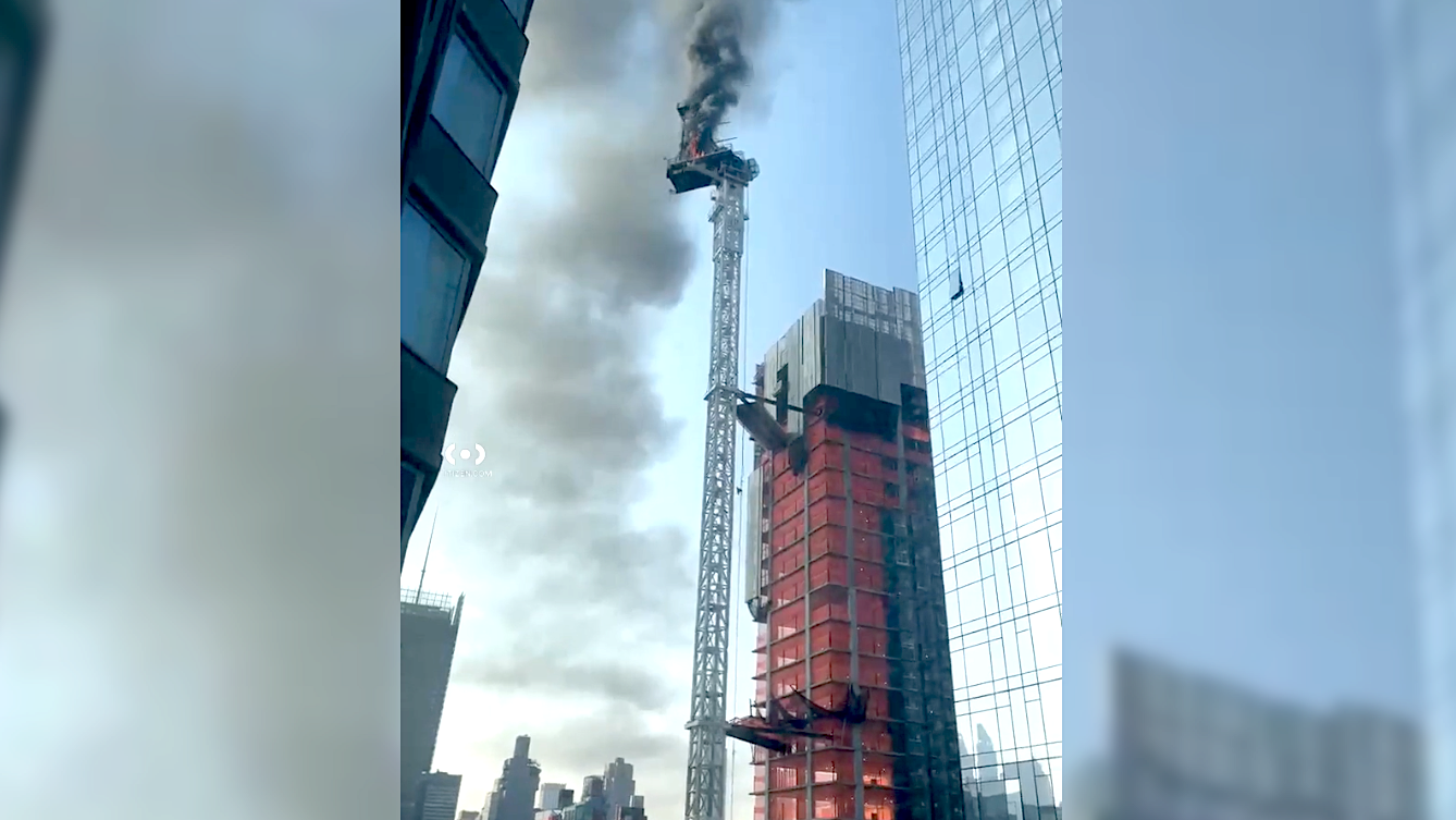 High-rise crane bursts into flames, collapses onto Hell's Kitchen street; at least 2 injured