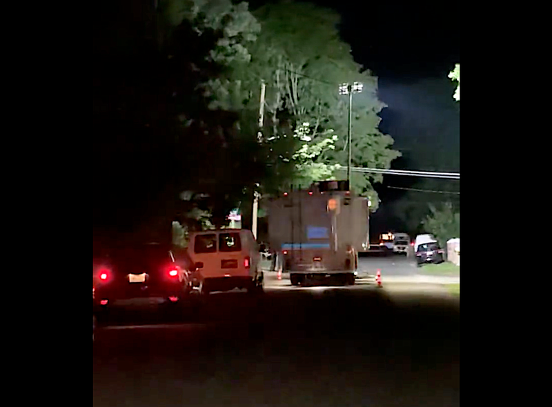 A mobile crime lab was outside the home on Monday morning