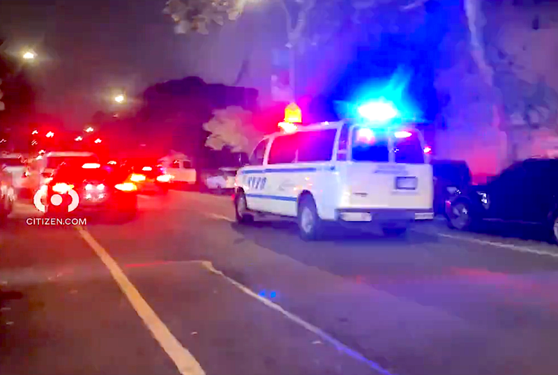 Police race to the scene of Wednesday's shooting on East 143rd Street in Mott Haven