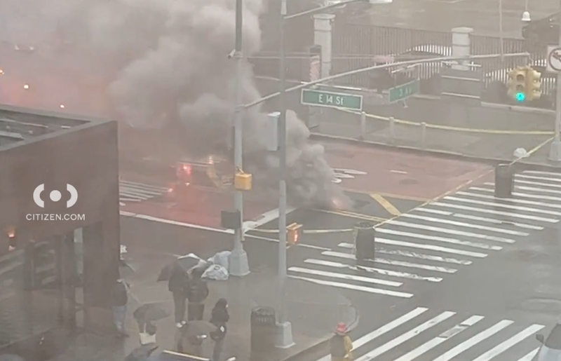 Firefighters arrived on scene and report a smoking manhole at the intersection.