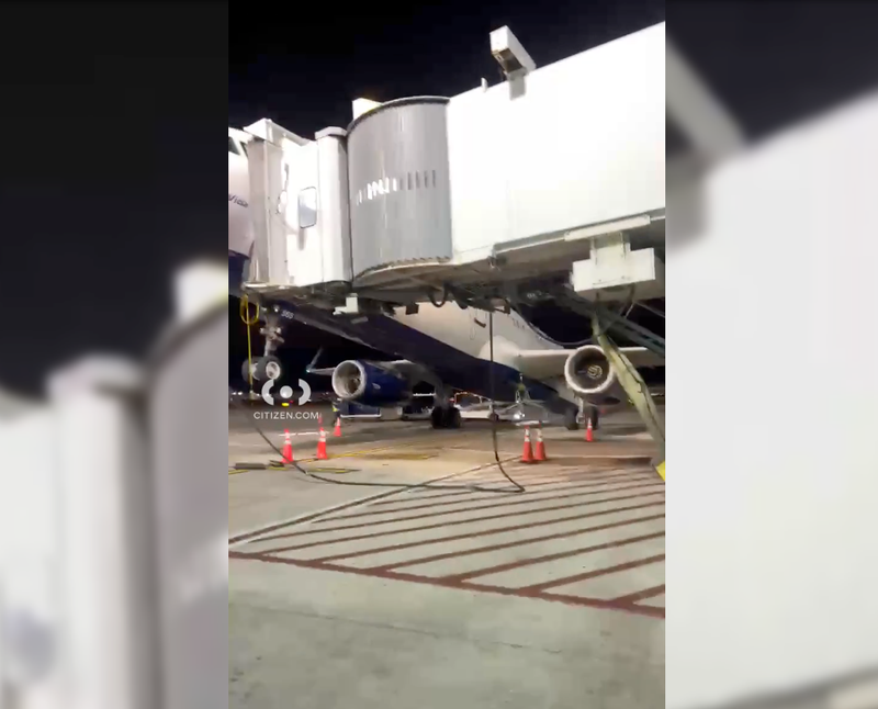 A shift in weight caused by deplaning caused the tail to dip towards the ground, officials said