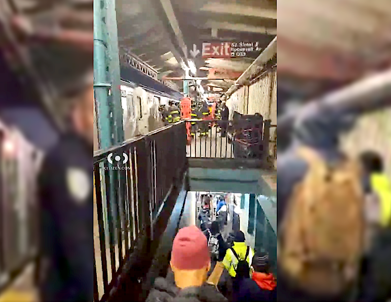 Members of the FDNY respond to the 82nd Street station in Jackson Heights, where a man was fatally struck by a 7 train
