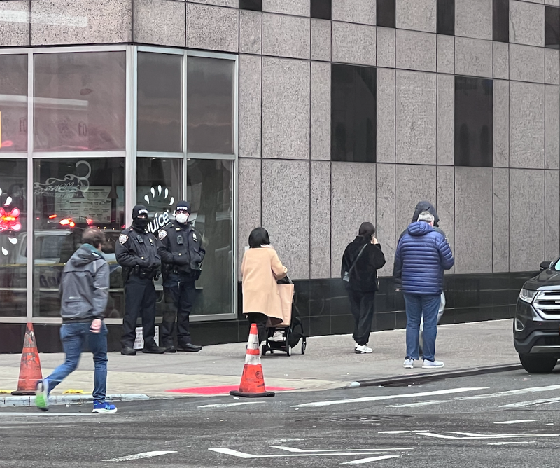 NYPD officers were seen masked near the scene of the steam line rupture due to potential asbestos