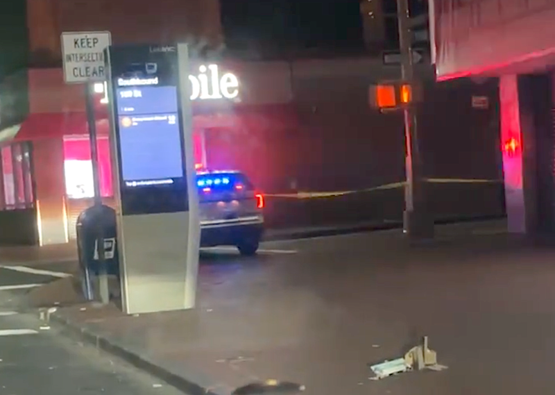 An NYPD vehicle blocks off a road at 168th Street and Jamaica Avenue