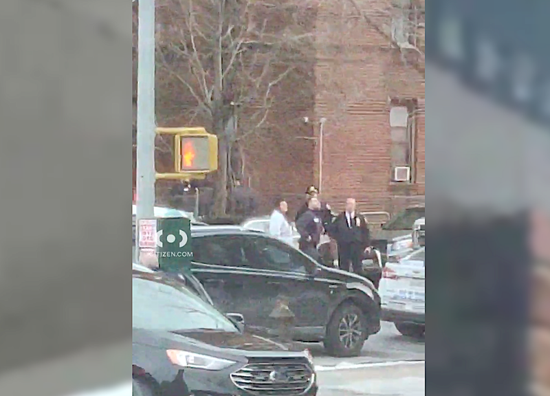 Three officers were injured, including a sergeant who suffered a slash wound to the head, police said