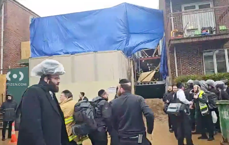 The basement floor of a home collapsed just after 12 p.m