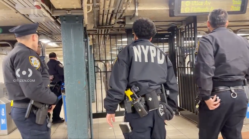 NYPD officers are seen responding to the fatal subway shoving, which happened just hours before the cop was punched at the same 125th Street 4/5/6 station
