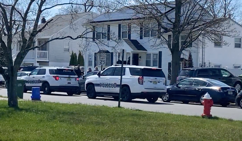Sayreville Police pull up at the family’s house Friday with the family outside