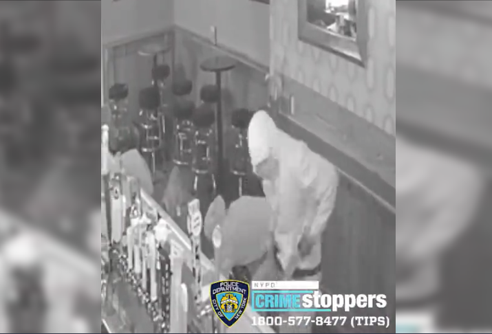 Video shows the suspects rummaging through the victim's belongings