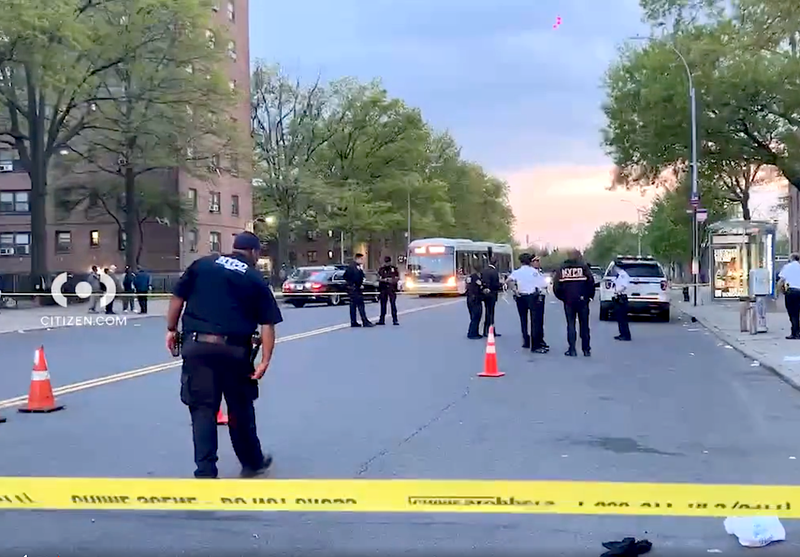 Police investigate at the scene of the fatal shooting at the NYCHA Throggs Neck Houses on Monday evening