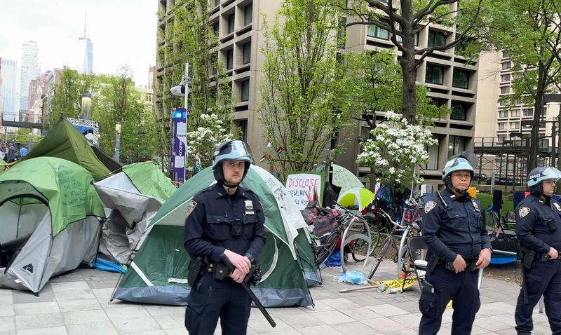 NYPD officers guard the NYU encampment on May 3, 2024