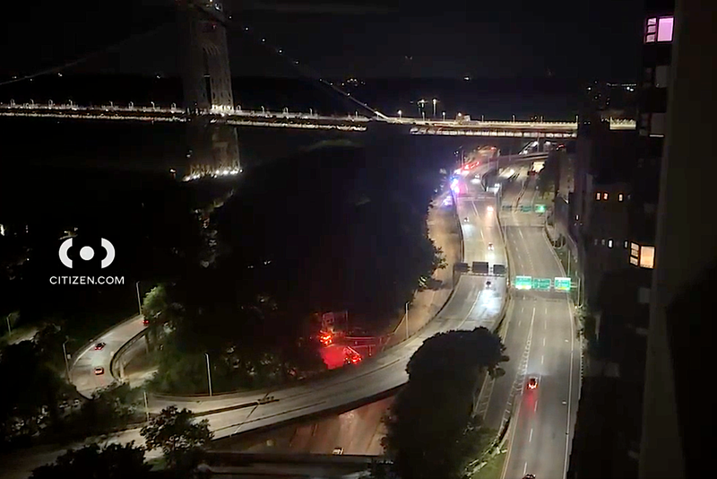 Emergency vehicles are seen in the area where the man fell