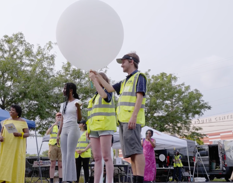 releasing white balloon