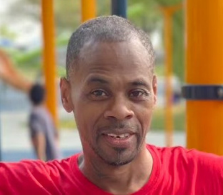 Man in red shirt