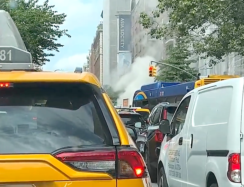Steam with confirmed asbestos poured out of the street on Wednesday afternoon in the area of East 69th Street and Park Avenue