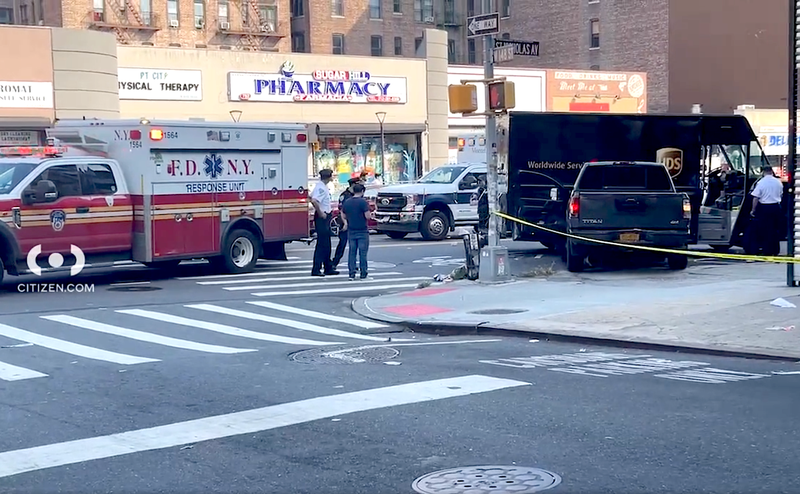 Witnesses said the pickup truck driver mounted a sidewalk instead of turning right at the light, striking two men in the process
