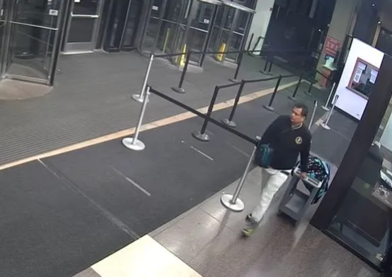 A still taken from surveillance footage shows the man suspected of stealing laptops and other items from the Cook County state's attorney's offices located at the Leighton Criminal Courthouse.