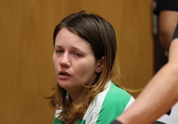 Kerri Bedrick appears in court in Riverhead on Wednesday as she pleads not guilty to various charges connected to the Aug. 22 crash