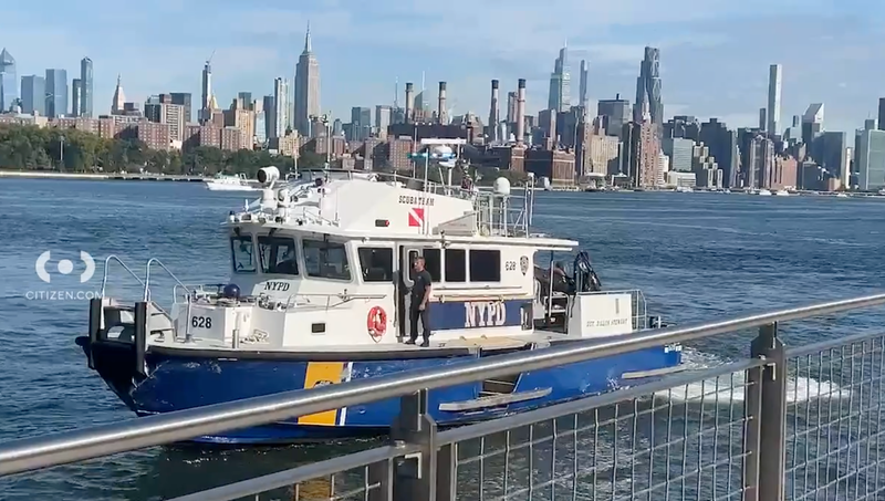 Members of the NYPD harbor unit were seen patrolling the waters below