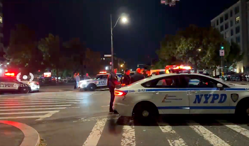 Police respond to the slashing in Harlem on Wednesday night