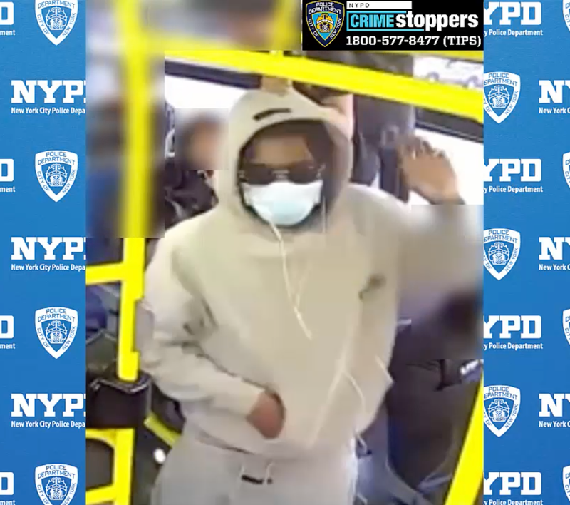 Video shows the suspect wearing a hoodie, mask and sunglasses on the bus around the time of the attack
