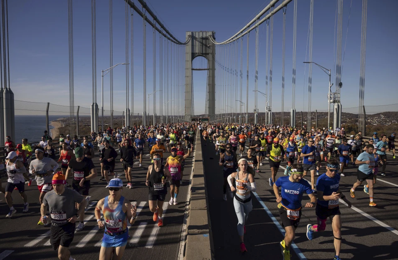 Runners cross the Verrazzano-Narrows Bridge at the start of the New York City Marathon, Sunday, Nov. 3, 2024, in New York.
