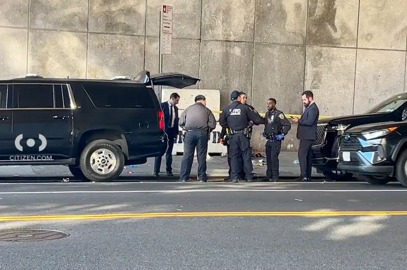 Police investigate at the scene in Tutor City where a woman was stabbed Monday morning