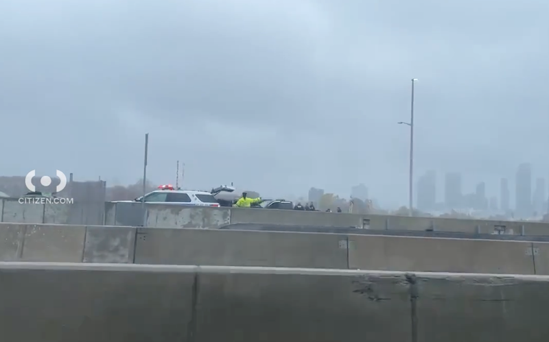 Police investigate at the crash scene on Thursday afternoon