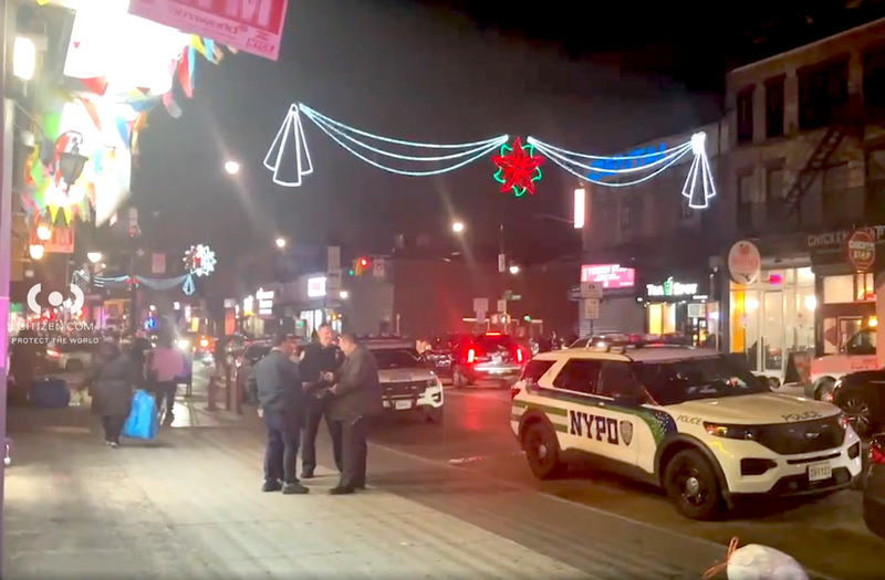 Police were seen investigating after the officer was mowed down at Fulton Street and Nostrand Avenue