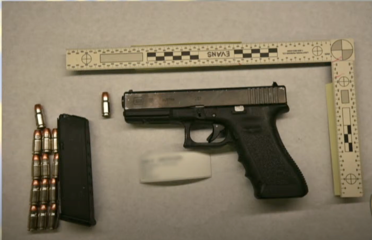 The suspect's firearm recovered at the scene.