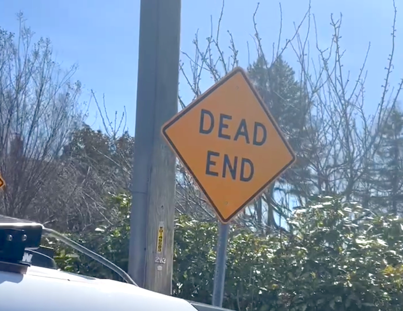 The shooting has stunned a "quiet" dead-end street in Dix Hills