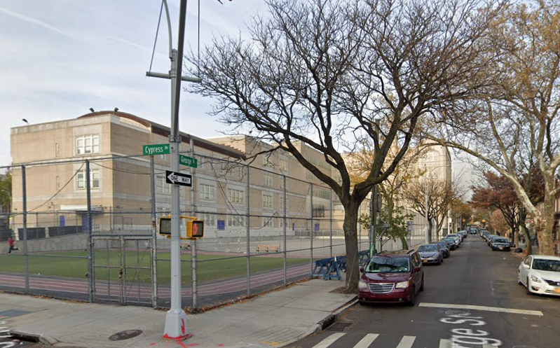 The NYPD is searching for a group of suspects in connection to the shooting death of a 19-year-man outside a Queens elementary school yard Tuesday evening.