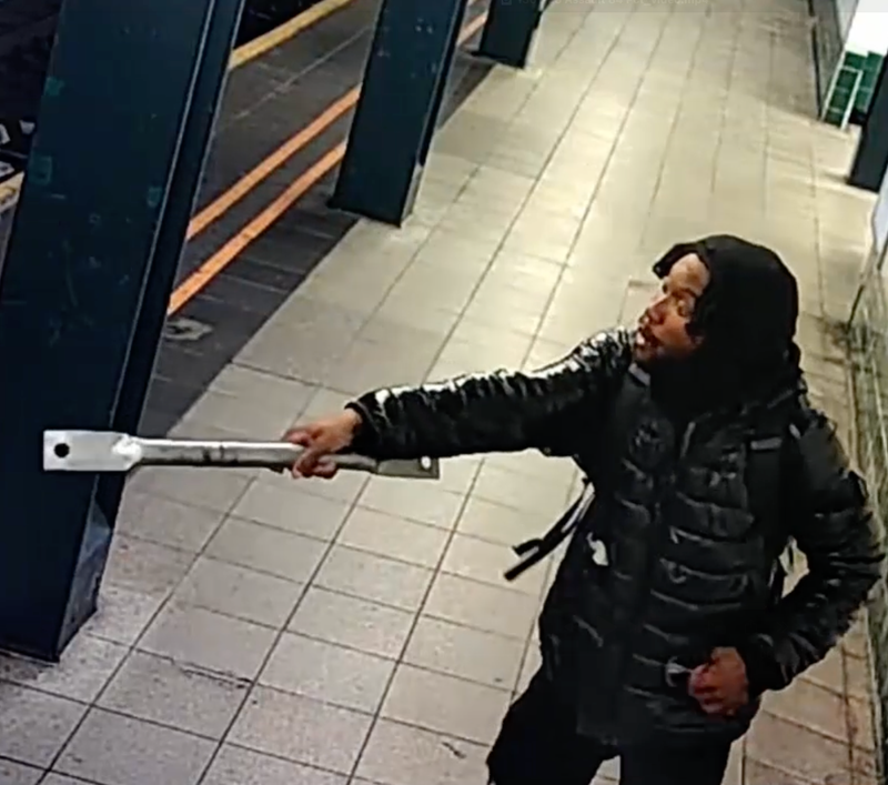 Footage shows the suspect with the metal pipe